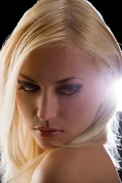 Blond on black Stock Photos