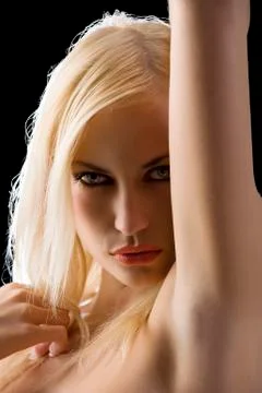 Blond on black Stock Photos