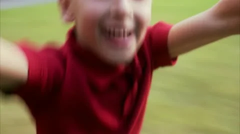 A blond boy is spinning around Stock Footage 11331033