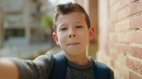 Blond child student having video call at street Video stock 189956645
