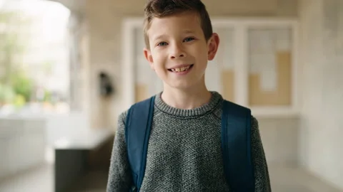 Blond child student smiling confident standing at school Stock Footage 198378448