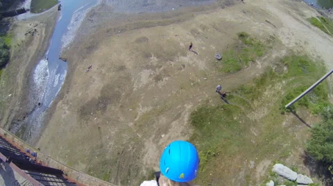 Blond falls down from the bridge Stock Footage 53350999