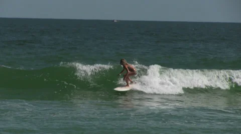 Blond Female Surfer Catches Wave Stock Footage 34973765
