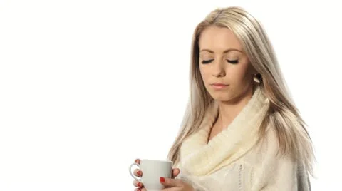 Blond girl drinks a drink and smiles Stock Footage 14988853