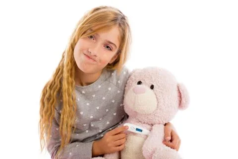Blond girl with teddy bear thermometer and flu Stock Photos