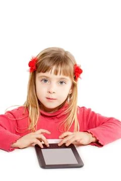 Blond kid little girl with ebook tablat pc portrait Stock Photos