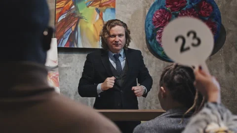 Blond Man Leading Auction Stock Footage 201679087