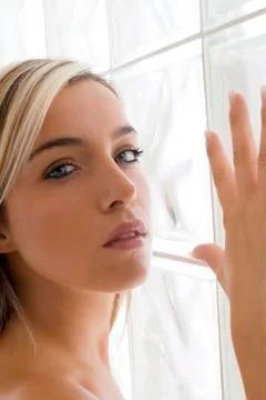 Blond near the wall Stock Photos