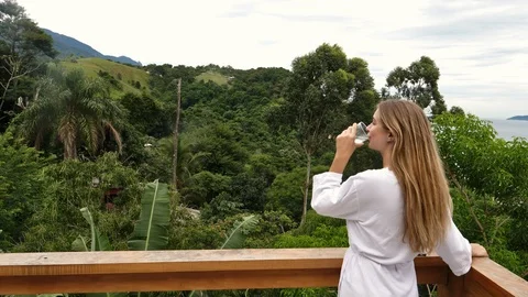 Blond relaxing over forest Stock Footage 94019882