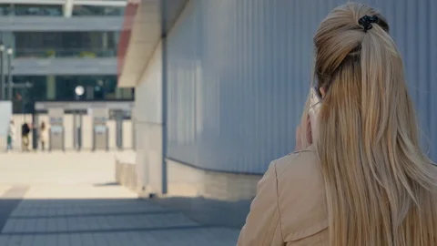 Blond talking phone Stock Footage 118526239