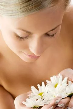 Blond with white daisy Stock Photos