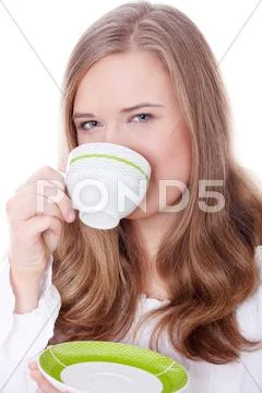 Blond woman drinking coffee Stock Photos