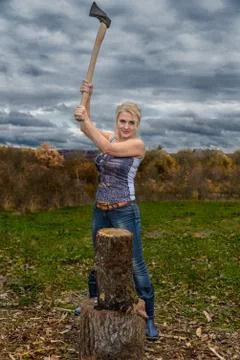 Blonde with axe Foto stock