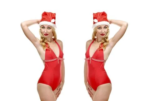 The blonde in a bathing suit and a red New Year's hat Stock Photos
