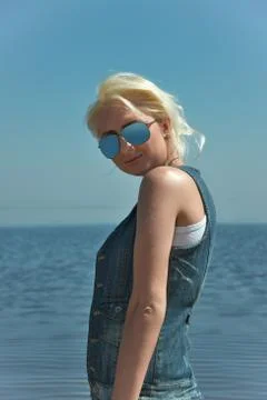 Blonde on the beach Foto stock