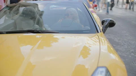 Blonde behind the wheel of the cabriolet Stock Footage 59860109