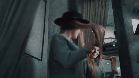 Blonde in a black hat Stock Footage 86608211