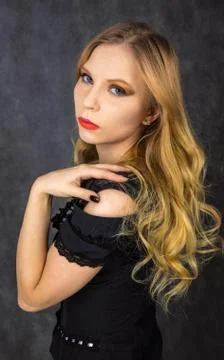 Blonde in black Stock Photos