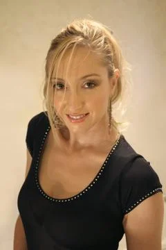 Blonde in black Stock Photos