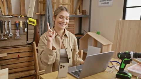 Blonde bombshell carpenter, number one in her trade, surprised with a brill.. Stock Footage 270330345
