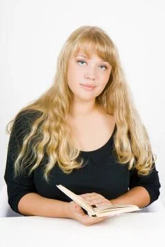 Blonde with a book Stock Photos