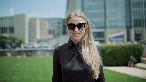 Blonde business lady having fun and successful on the street Stock Footage 101852753