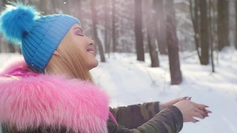 Blonde in a Cap Cornflower blue Smiling at Camera Stock Footage 84121548