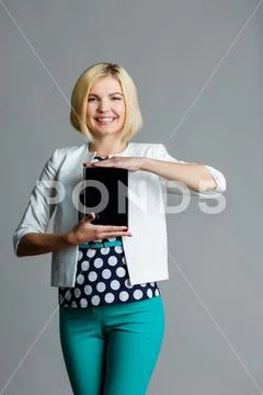 Blonde on clean gray background Stock Photos