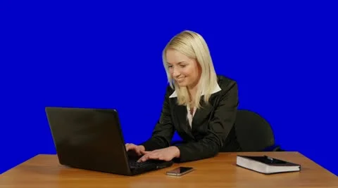 Blonde with computer Stock Footage 10832748
