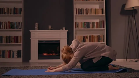 Blonde doing workout indoors Stock Footage 150204286