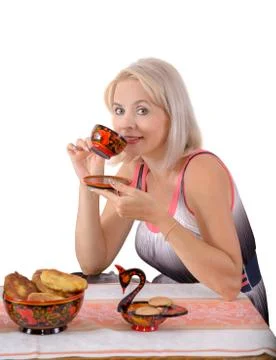 The blonde drinks tea Stock Photos