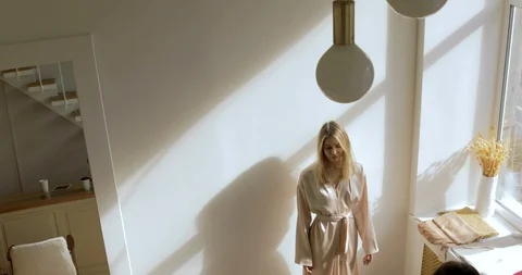 Blonde Female Model Is Posing In Front Of Smartphone Camera Of Photographer. Stock Footage 126029371