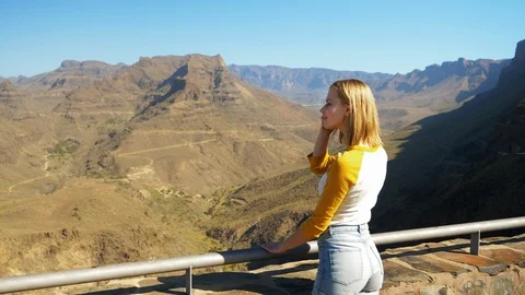 Blonde Female Model at the View Point Admiring the Gran Canaria Landscape Video stock 114324173