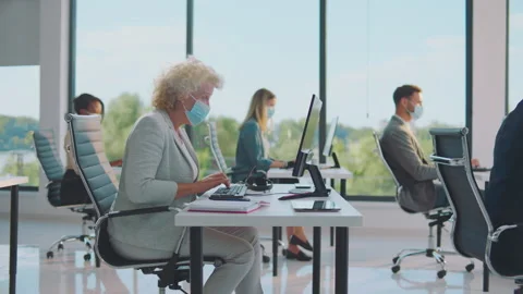 Blonde female searching data in computer Video stock 164573347