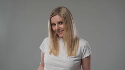 Blonde is flirting in front of the camera Stock Footage 107124975