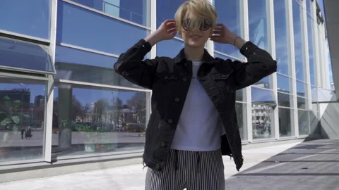 The blonde is in front of the camera Stock Footage 103936754