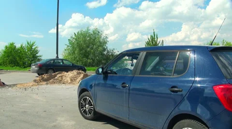 Blonde gets in the car Stock Footage 30242399