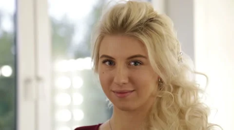 Blonde girl looking at the camera Stock Footage 67985247