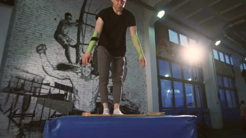 Blonde guy doing hand stand. Stock Footage 96612056