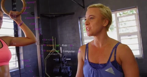 Blonde instructor gesturing launching cyber security code overlay while guiding Stock Footage 317793437