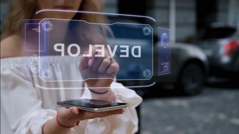 Blonde interacts HUD hologram Develop Stock Footage 141457784