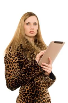 Blonde keeps the tablet pc Stock Photos