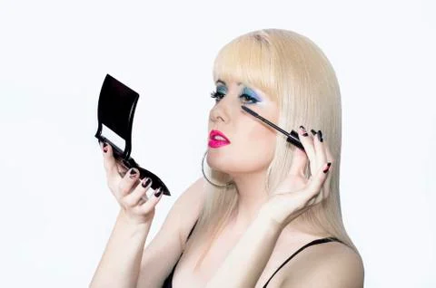 The blonde makes up eyelashes Stock Photos