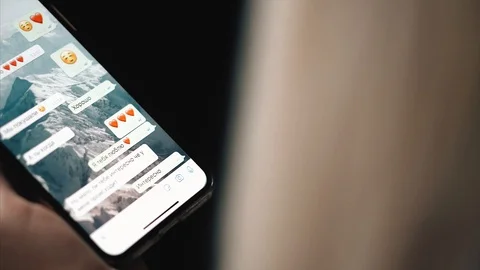 Blonde is messging with the iphone x Stock Footage 99701030