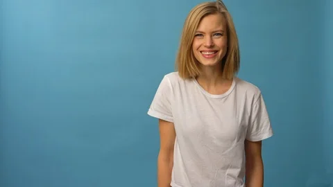 Blonde model with get that expression while smiling Stock Footage 103624654