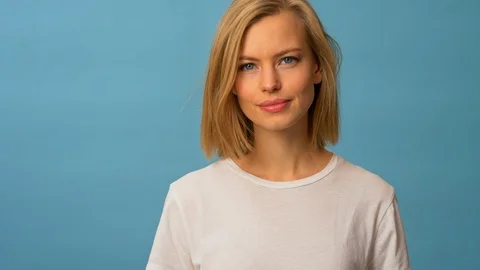 Blonde model having a conversation over the phone Stock Footage 103625954