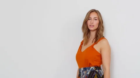 Blonde Model with a Perfect Set of Teeth Tucking Hair And Smiles in Side View 스톡 동영상 116891796