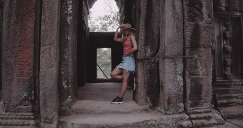 Blonde Model Poses on a Magnificent Temple Ruins Stock Footage 155395300