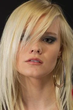 Blonde Model Poses In A Studio Environment Stock Photos