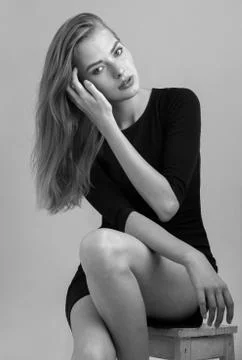 Blonde model posing sitting Stock Photos